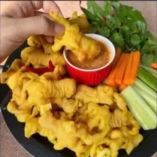 Hình ảnh Chân gà ủ muối rút xương