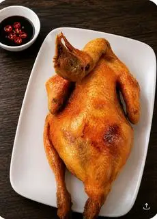 Hình ảnh Gà ta nguyên con xối mỡ