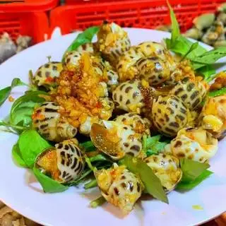 Hình ảnh Ốc Hương Xào Bơ Tỏi 