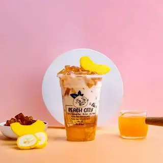 Hình ảnh Trà đào dầm sữa đầy đủ 500ml