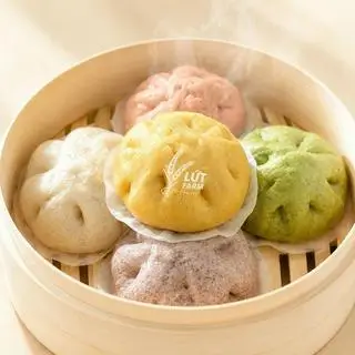 Hình ảnh 1 cái)bánh bao ngũ sắn heathy (thành phần bột gạo lứt nguyên chất, bột mì nguyên cám,+màu tự nhiên từ rau củ ( khách ăn bánh ba