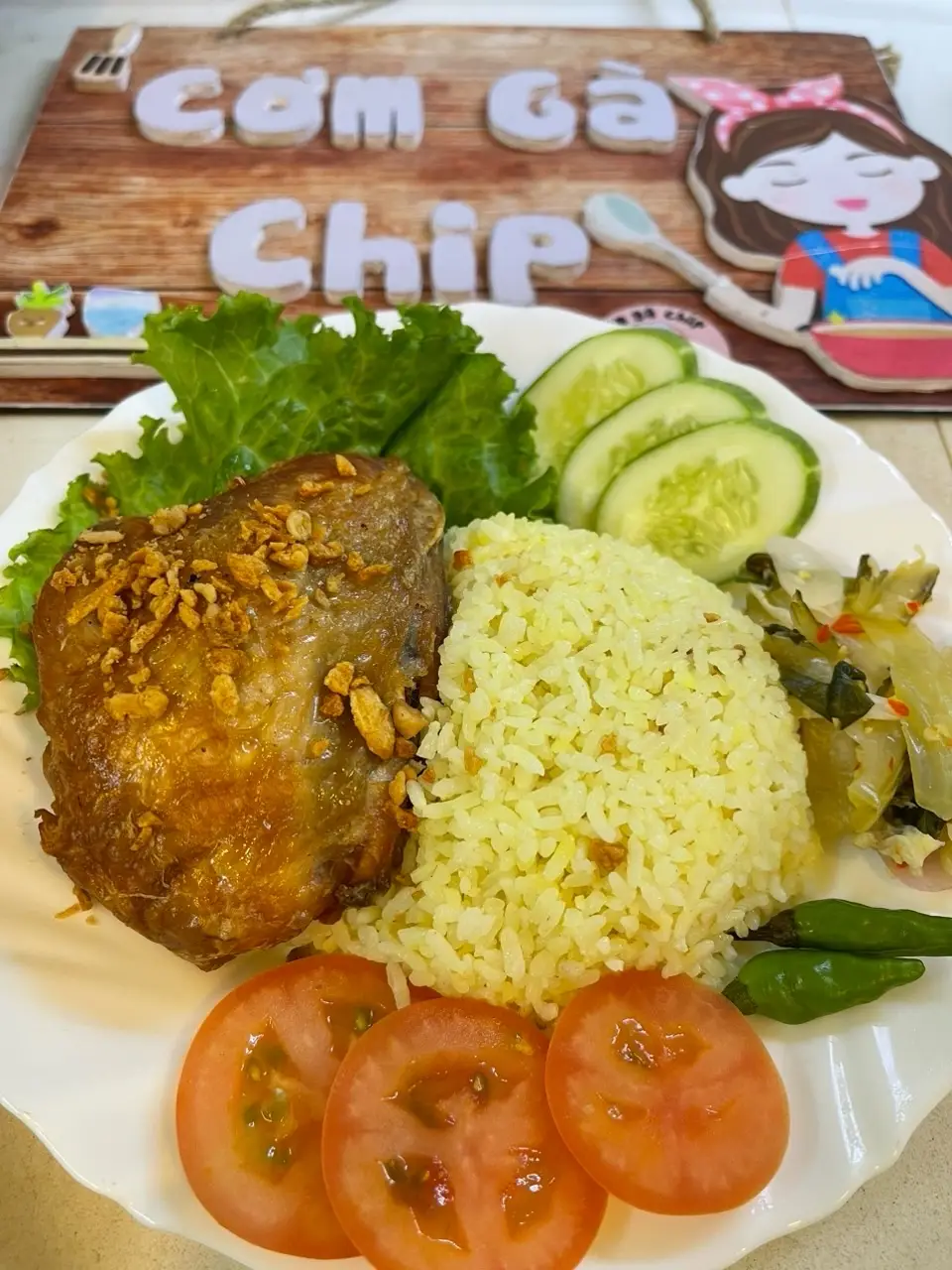 Hình ảnh CƠM GÀ SỐT MẮM TỎI ( ĐÙI TỎI/ MÁ ĐÙI)