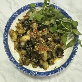 Hình ảnh Đầu ốc bươu xào sate