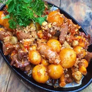 Hình ảnh Mề gà xào trứng non