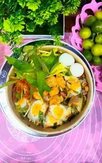 Hình ảnh Cuộn tóp mỡ trứng lòng đào lắc khô bò
