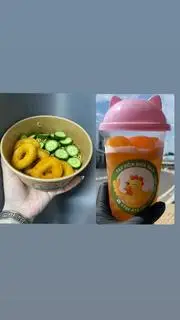 Hình ảnh Omachi khoanh mực + trà chanh 500ml