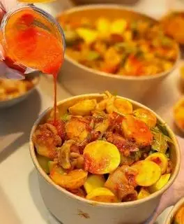 Hình ảnh Chân Gà Bạch Tuộc Sốt Thái