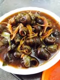 Hình ảnh ốc lẫn xào me/ xào cay