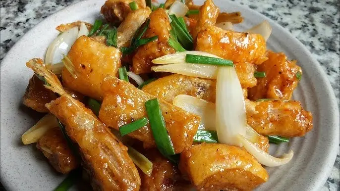 Hình ảnh Cơm vây cá hồi tắm mắm