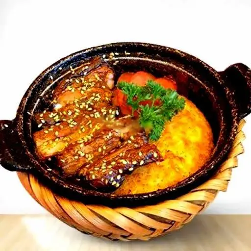Hình ảnh Cơm Niêu Gà Sốt Chua Ngọt 1 Mặt Cháy 