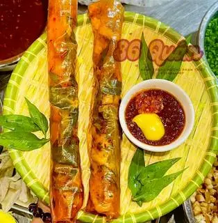 Hình ảnh Bánh tráng đỏ cuốn mắm ruốc