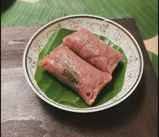 Hình ảnh 1 cây nhỏ 25 gram nem chua thịt thêm