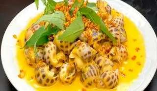 Hình ảnh Ốc hương xào bơ tỏi 