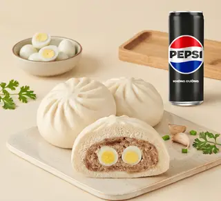 Hình ảnh Bánh bao 2 trứng cút thịt heo + Pepsi không Calo