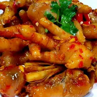 Hình ảnh chân gà rút xương sốt me-1 hộp  7,8 chân mix xoài cóc