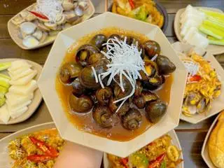 Hình ảnh Ốc to xào me