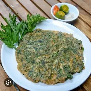 Hình ảnh hột gà ta chiên ngải cứu 