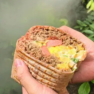 Hình ảnh Tacos bò bằm phomai xốt chanh dây