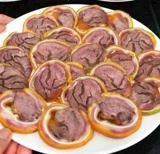 Hình ảnh Tai heo cuốn bắp bò ủ muối 300gr