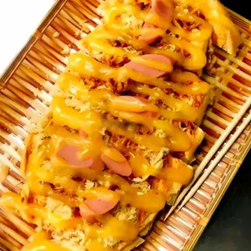 Hình ảnh Bánh Mì Nướng Sốt ( Suất Nhỏ 1 Bánh - Kem Phomai )