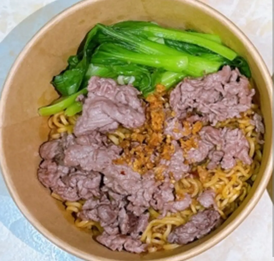 Hình ảnh Mì Trộn Sa Tế Bò + nước soup nấm kim châm