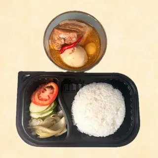 Hình ảnh Cơm heo quay kho trứng 