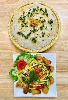 Hình ảnh CƠM CHÁY GỎI XOÀI CÁ DỨA