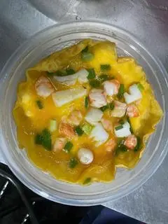 Hình ảnh Cơm chiên mực phủ trứng