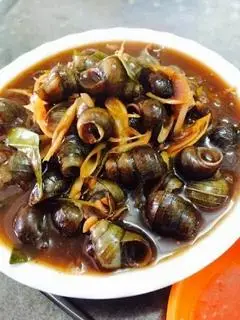 Hình ảnh Ốc vặn xào me