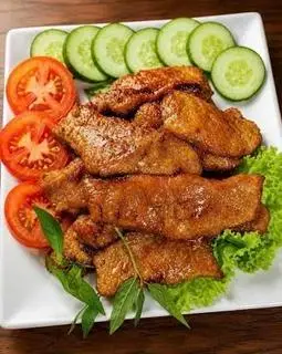 Hình ảnh Vú Heo 300g Ốp Nước Sốt + Đậu Bắp