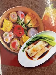 Hình ảnh combo 5 viên Dimsum + bánh cuốn Hải sản + trà tắc