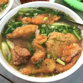Hình ảnh Bánh đa cá chua cay+ 1 quẩy 