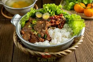 Hình ảnh Cơm Tấm Sườn Cốt Lết Tươi Nướng Củi