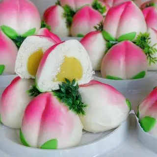 Hình ảnh Bánh Bao Chay Trái Đào Lá Đậu Xanh 280g 