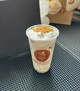 Hình ảnh Trà sữa olong nhài kem dừa nướng