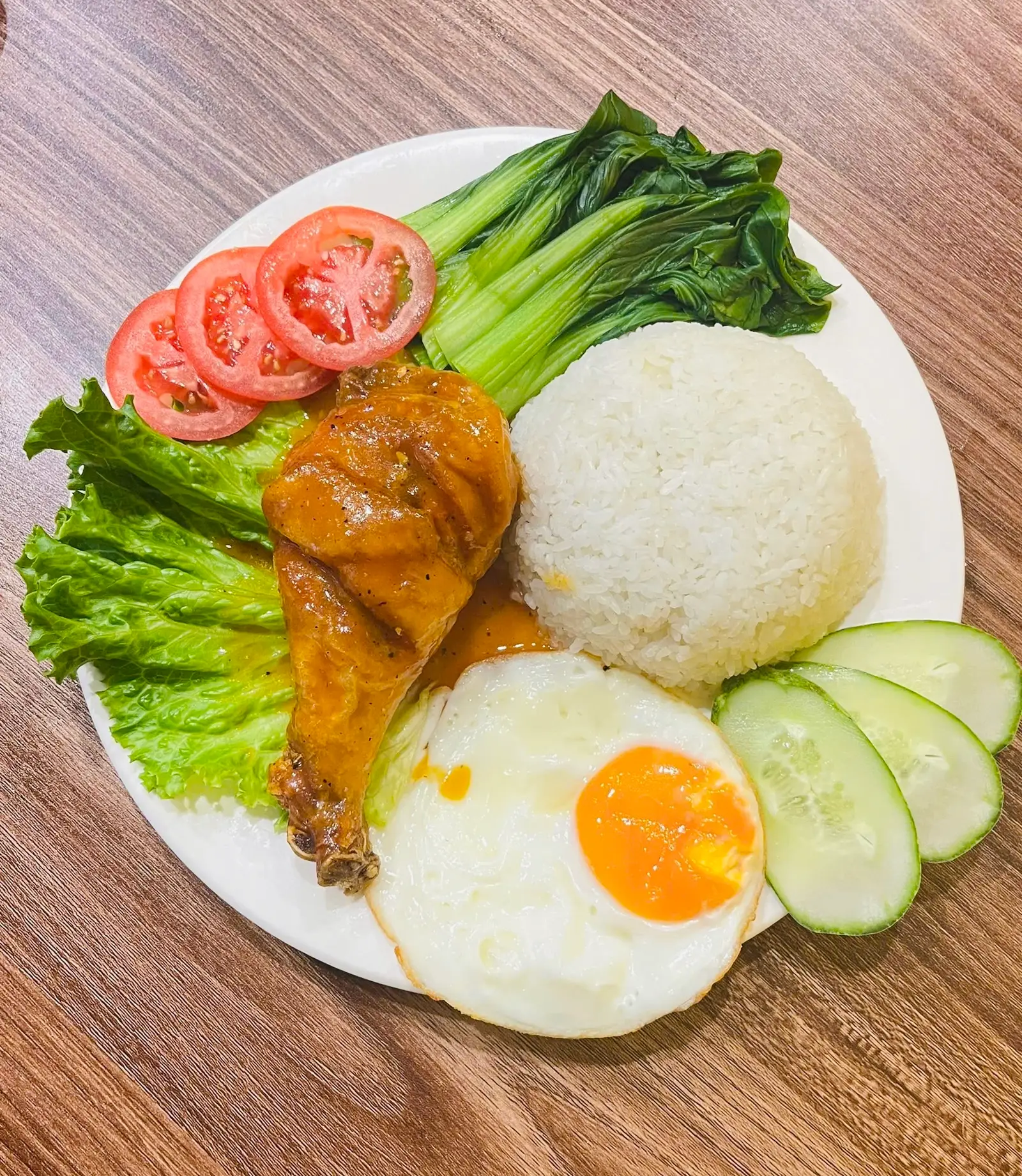 Hình ảnh Cơm đùi gà sốt chua ngọt + trứng ốp