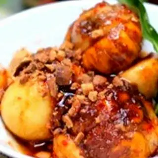 Hình ảnh Trứng gà nướng xào me