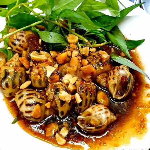 Hình ảnh Ốc hương xào me