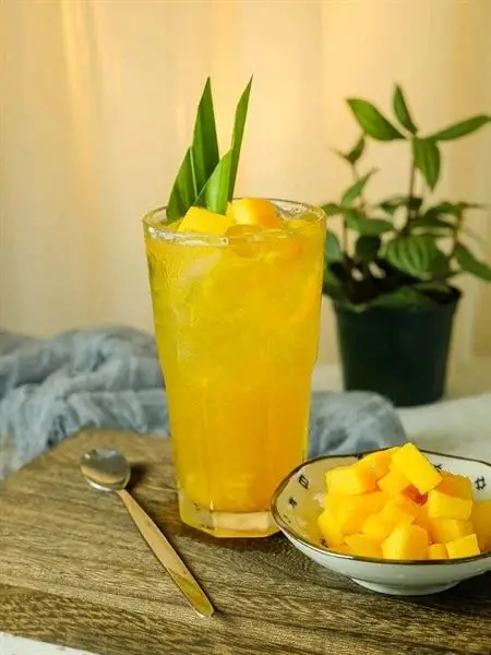Hình ảnh trà tắc cam xoài