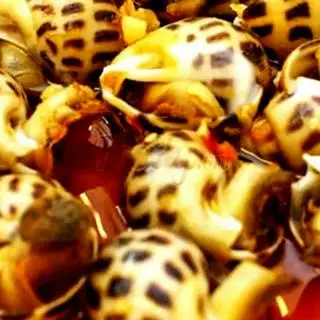 Hình ảnh Ốc hương xào bơ - tỏi - muối ớt