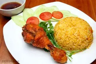 Hình ảnh Cơm rang đùi gà chua ngọt