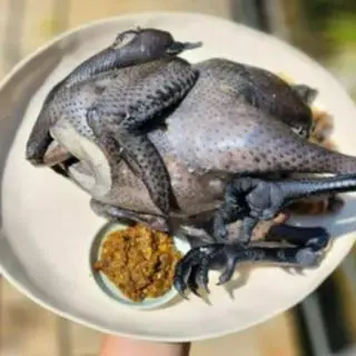 Hình ảnh gà đen tây bắc hấp cả con tặng coca 