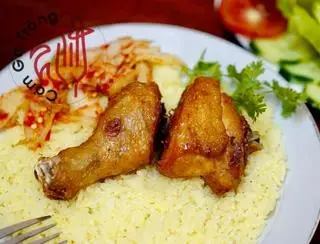 Hình ảnh Cơm đùi gà chiên mắm tỏi