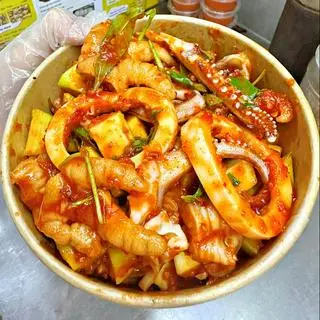 Hình ảnh Mực ống mix chân gà- phần lớn 