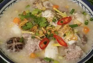 Hình ảnh cháo hến + 1 trứng lộn