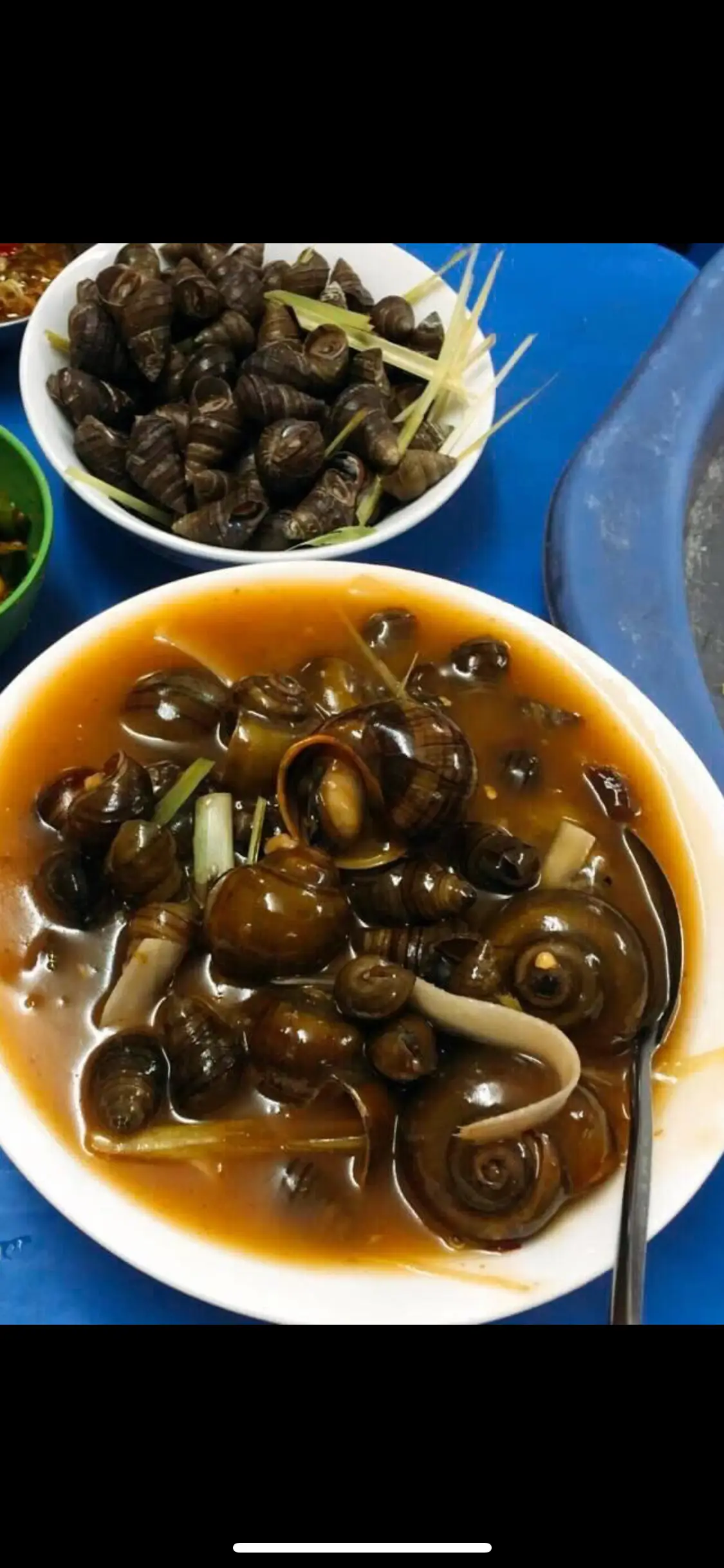 Hình ảnh Ốc lẫn xào me dừa