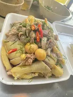Hình ảnh GÀ HẤP LÁ CHANH NGUYÊN CON KÈM TRỨNG - chặt sẵn