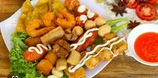 Hình ảnh Combo cá viên chiên sốt  mắm tỏi nhỏ