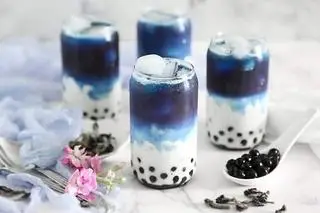 Hình ảnh Sữa tươi trân châu đường đen hoa đậu biếc