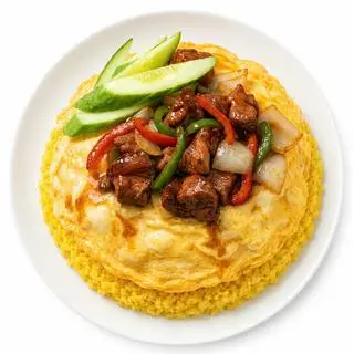 Hình ảnh Cơm bò lúc lắc phủ trứng